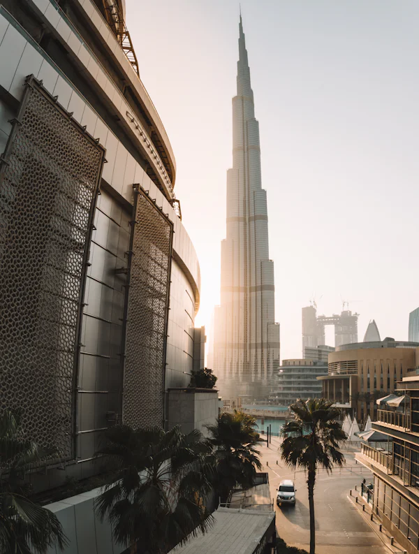 Burj Khalifa at golden hour beside The Dubai Mall