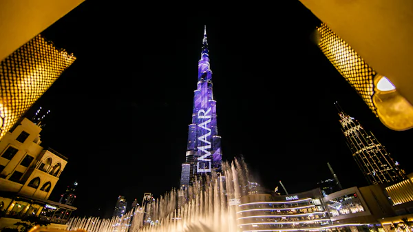 The Dubai Fountain show in front of Burj Khalifa at night